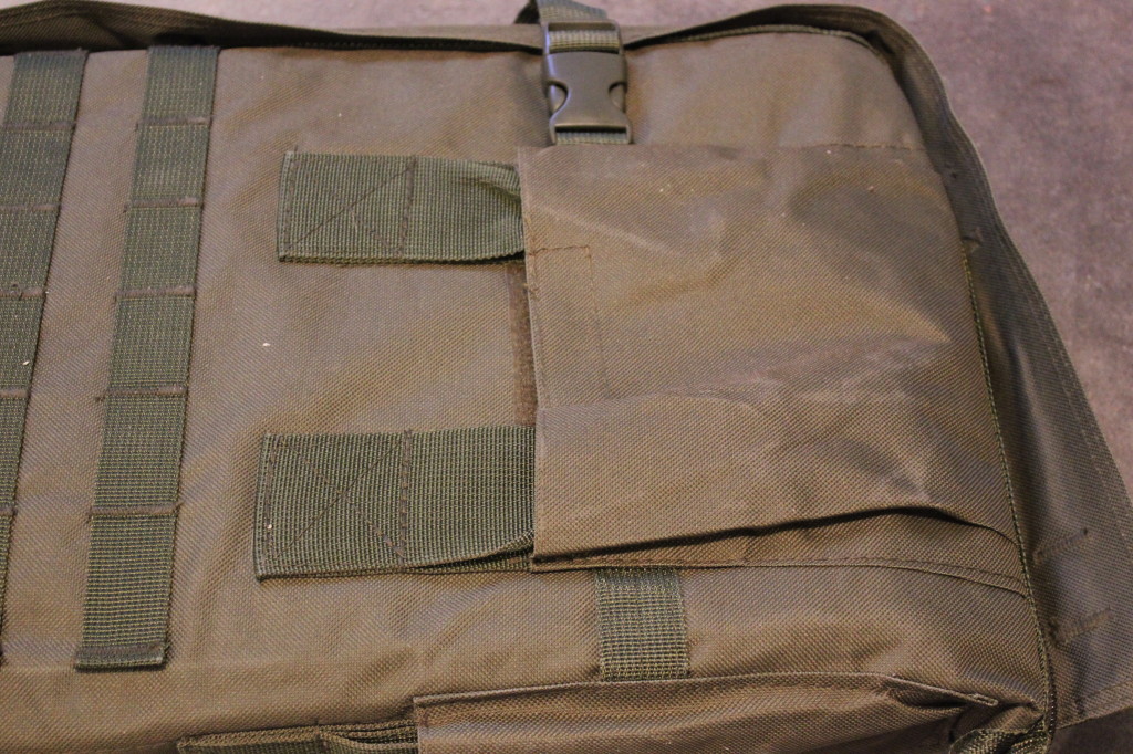 Handle hides away in a velcro pocket to prevent snagging
