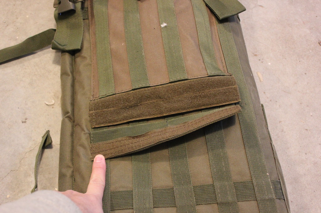 The other side of the pouch has the bottom portion of the straps.