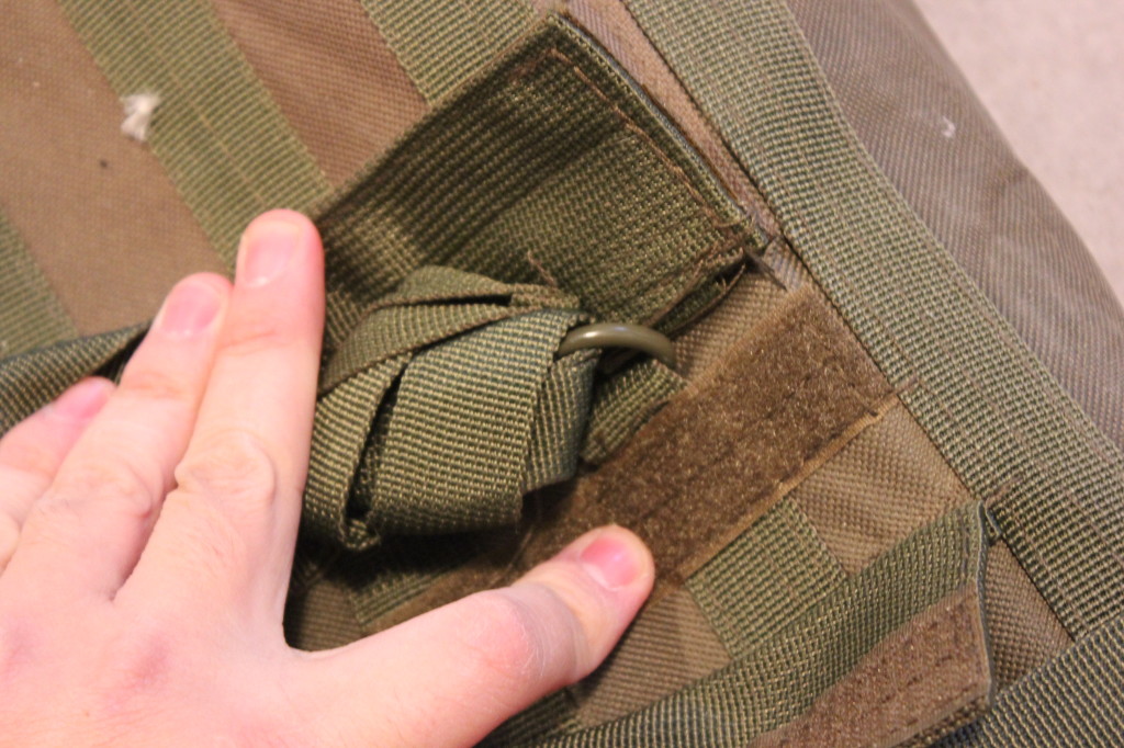 And in case you don't like the straps, they're connected to the bag at these d rings so you can replace them without having to sew.